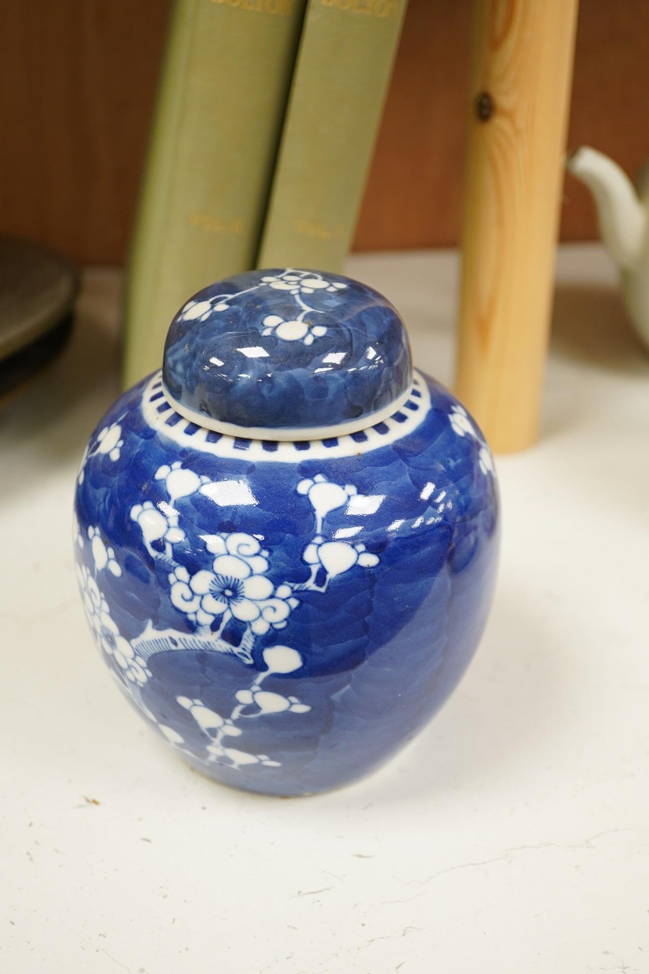 A group of Chinese blue and white porcelain, including a mid 19th century Canton enamel teabowl and a Japanese small dish, tallest 22cm. Condition - fair